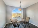 Cozy dining area featuring a table with seating for two and a bright window view at 9451 E Becker Ln # 2027, Scottsdale, AZ 85260