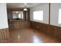 Bright living room featuring wood-look flooring and ample natural light at 9501 E Broadway Rd # 237, Mesa, AZ 85208