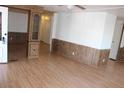 Open-concept living area with durable wood-look flooring throughout at 9501 E Broadway Rd # 237, Mesa, AZ 85208