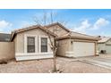 Beautiful one story home featuring desert landscaping and a two-car garage at 1565 E 10Th St, Casa Grande, AZ 85122