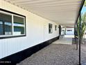 Exterior showcasing the covered walkway, providing shelter and access to the home's entrance at 4065 E University Dr # 407, Mesa, AZ 85205