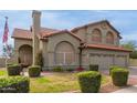 Charming two-story home with front yard including mature landscaping at 12443 W Monte Vista Rd, Avondale, AZ 85323