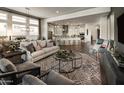 Open-concept living room and kitchen featuring hardwood floors and neutral colors at 2038 W Union Park Dr, Phoenix, AZ 85085