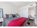 Bright bedroom with a modern bed, sleek bedding, and an adjoining seating area, creating a relaxing retreat at 6345 N 49Th Ave, Glendale, AZ 85301