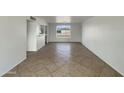 Spacious living room with tile flooring, offering a clean and modern aesthetic at 7020 E Oak St, Scottsdale, AZ 85257