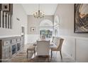 Bright dining room featuring natural light, pendant lighting and neutral decor at 19240 N 90Th Pl, Scottsdale, AZ 85255