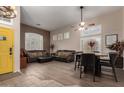 Inviting living area featuring tile and wood flooring, with ample seating and natural light at 265 E Liberty Ln, Gilbert, AZ 85296