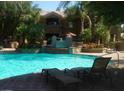 Sparkling pool with lounge chairs, perfect for relaxation and enjoying the beautiful outdoor scenery at 5335 E Shea Blvd # 1095, Scottsdale, AZ 85254