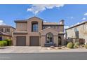 Attractive two-story house showcasing a charming window and neat landscaping under a blue sky at 22206 N 36Th Way, Phoenix, AZ 85050