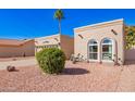 Attractive single-story home featuring stucco exterior and desert landscaping at 25236 S Lakeway Dr, Sun Lakes, AZ 85248