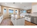 Open-concept kitchen featuring granite countertops and stainless steel appliances at 34515 N 142Nd St, Scottsdale, AZ 85262