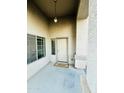 A cozy front porch with a 'HELLO' doormat and overhead light fixture at 6727 E Stacy St, Florence, AZ 85132