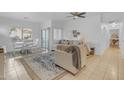 Inviting living room with tile floors, comfortable seating, and an open layout that is bright and airy at 12050 N Panorama Dr # 107, Fountain Hills, AZ 85268
