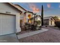 Attractive single-Gathering house featuring desert landscaping, a three-car garage, and a cozy entryway at 3037 E Bighorn Ave, Phoenix, AZ 85048