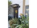 Charming front entrance with a welcoming sunflower wreath and decorative plants at 3637 E Monterosa St # 5, Phoenix, AZ 85018