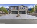 Charming two-story home featuring an attached two-car garage and low-maintenance desert landscaping at 1111 E Mcneil St, Phoenix, AZ 85042