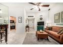 Comfortable living area showcasing stylish decor, tile flooring and bright, open layout at 14209 N Palm Ridge Dr, Sun City, AZ 85351