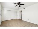 Spacious bedroom with light-colored flooring, ample closet space, and natural light, perfect for relaxation at 2117 W Pontiac Dr, Phoenix, AZ 85027