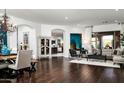 Spacious living room with hardwood floors, recessed lighting, and an open-concept design at 31709 N 16Th Ave, Phoenix, AZ 85085