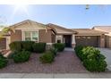 Charming single-Gathering home with a well-manicured lawn and a two-car garage at 3254 N Park St, Buckeye, AZ 85396