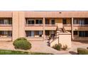 Image of a well-maintained apartment building with inviting balconies, showcasing the pleasant exterior and tidy landscaping at 3601 W Tierra Buena Ln # 233, Phoenix, AZ 85053