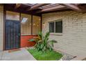 Charming entryway with secure door, decorative rocks, and a welcoming mat at 4203 N 36Th St # 23, Phoenix, AZ 85018