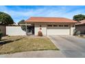 Inviting home with a two-car garage, gated courtyard, and xeriscaped front yard at 421 Leisure World --, Mesa, AZ 85206