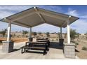 Park pavilion offers shaded picnic area for gatherings and outdoor enjoyment at 5583 S 240Th Ln, Buckeye, AZ 85326