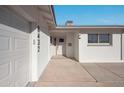 Welcoming front entrance of a bright home with fresh paint, easy access, and clear address numbers at 8432 E Keim Dr, Scottsdale, AZ 85250