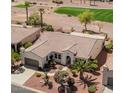 Charming single-story home featuring desert landscaping and a tile roof at 23034 N Pedregosa Dr, Sun City West, AZ 85375