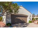 Close up of a well maintained two-car garage at 23034 N Pedregosa N Dr, Sun City West, AZ 85375