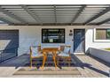 Inviting covered patio with pergola, seating, and shaded outdoor living at 3350 W Charter Oak Rd, Phoenix, AZ 85029