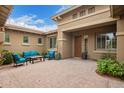 Private courtyard with brick pavers, comfortable seating, and a cozy atmosphere at 3881 E Birchwood Pl, Chandler, AZ 85249