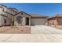 Charming single story home with a tile roof, stucco exterior, and a two car garage at 3906 N 103Rd Ave, Avondale, AZ 85392