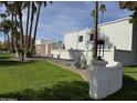 Well-maintained landscaping and modern architecture at this community at 8588 E Indian School Rd # G, Scottsdale, AZ 85251