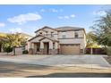 Charming two-story home with desert landscaping, covered entry, and a two car garage at 925 E Doris St, Avondale, AZ 85323