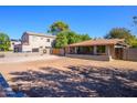 Charming single-story home with a welcoming front porch and a well-maintained yard at 2217 N 37Th Pl, Phoenix, AZ 85008