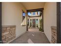 Inviting entrance with stone accents leading to a stylish front door, perfect for welcoming guests at 3793 E Canyon Pl, Chandler, AZ 85249