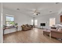 Spacious living room with lots of windows and neutral decor at 5634 N 82 Ave, Glendale, AZ 85303