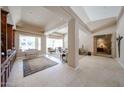 Spacious living room with travertine floors and ample natural light at 10125 N 78Th Pl, Scottsdale, AZ 85258