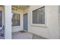 Close up of a condo front door featuring a welcoming door mat at 1222 W Baseline Rd # 114, Tempe, AZ 85283