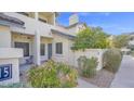 Welcoming condo exterior with a private patio area and well-maintained landscaping at 1222 W Baseline Rd # 114, Tempe, AZ 85283
