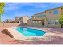 Home featuring a large pool with brick patio and steps that enter into the water at 3316 E Kingbird Pl, Chandler, AZ 85286