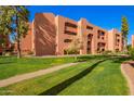 Attractive exterior view showcasing well-maintained landscaping and the building's architecture at 4303 E Cactus Rd # 408, Phoenix, AZ 85032