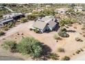 Aerial view of house on large lot featuring desert landscaping and mature trees at 6404 S Lazy Ln, Gold Canyon, AZ 85118