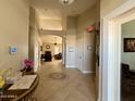 Spacious foyer with tiled floors, high ceilings, and an open view of the living spaces at 757 W Magma Rd, San Tan Valley, AZ 85143