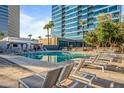 Relaxing pool area with comfortable lounge chairs and shade at 1 E Lexington Ave # 1211, Phoenix, AZ 85012