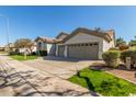 Well-maintained single-story home with a spacious driveway and a neatly landscaped front yard at 3751 S Vista Pl, Chandler, AZ 85248