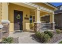 Welcoming front porch with stylish accents and inviting seating area at 4498 E Bethena St, Gilbert, AZ 85295