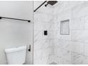 Renovated bathroom with custom tile work, modern fixtures, and white paint at 2593 E Commonwealth Cir, Chandler, AZ 85225